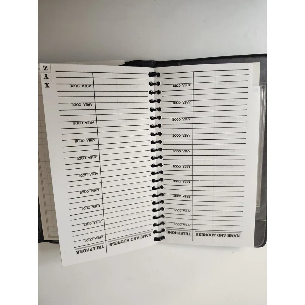 Day Planner With pen. Plastic Photos Holder